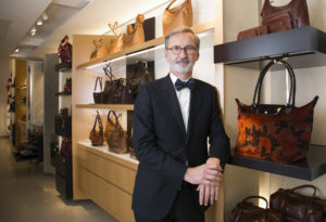 Longchamp CEO Jean Cassegrain at the company's Madison Avenue boutique in New York City on Nov. 5, 2014. This year Longchamp, the French leather goods and clothing house is celebrating the 20th anniversary of its iconic Le Pliage® bag. EET_2013